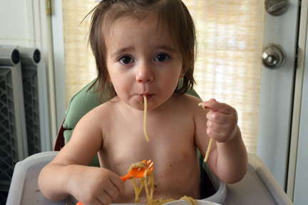 baby eating spaghetti